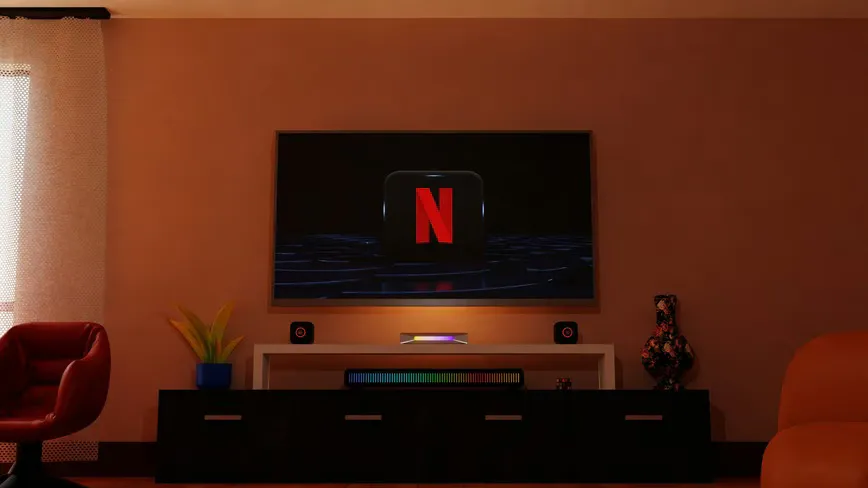Television screen and remote control in a living room