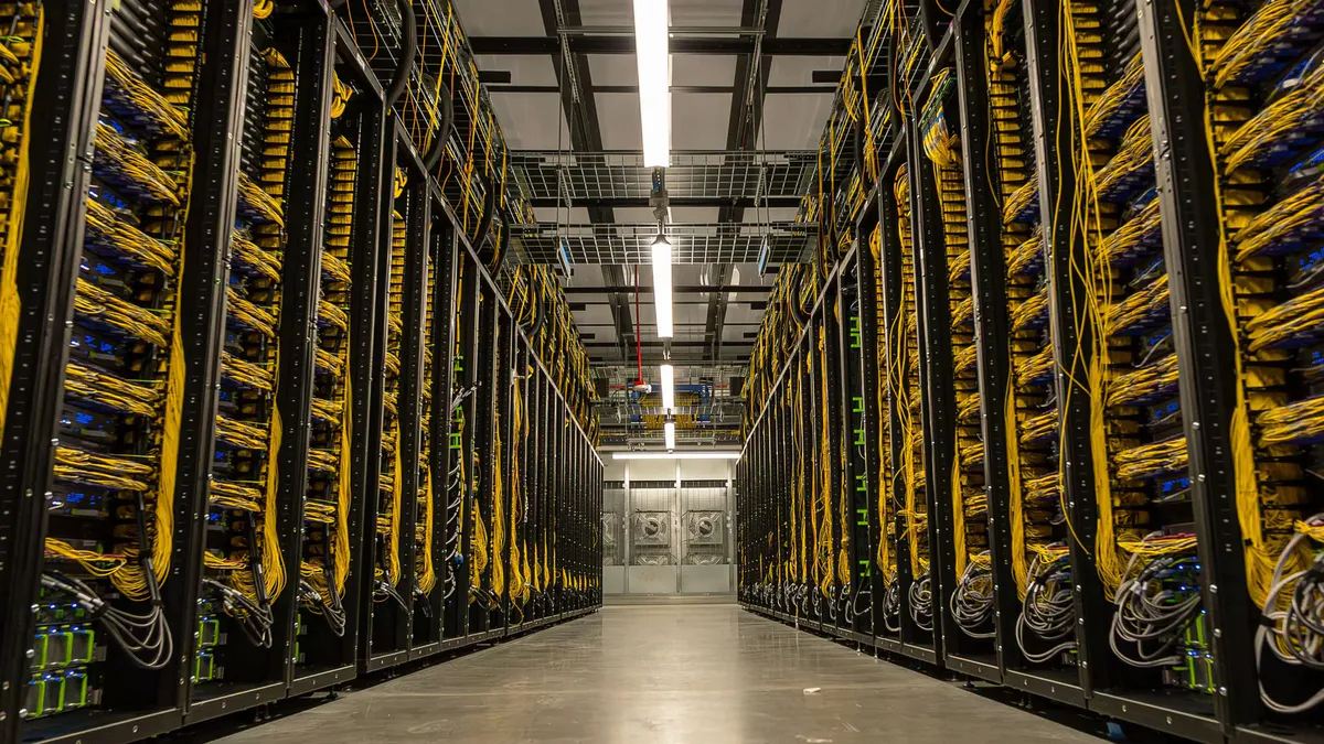 Rows of server racks inside a data center