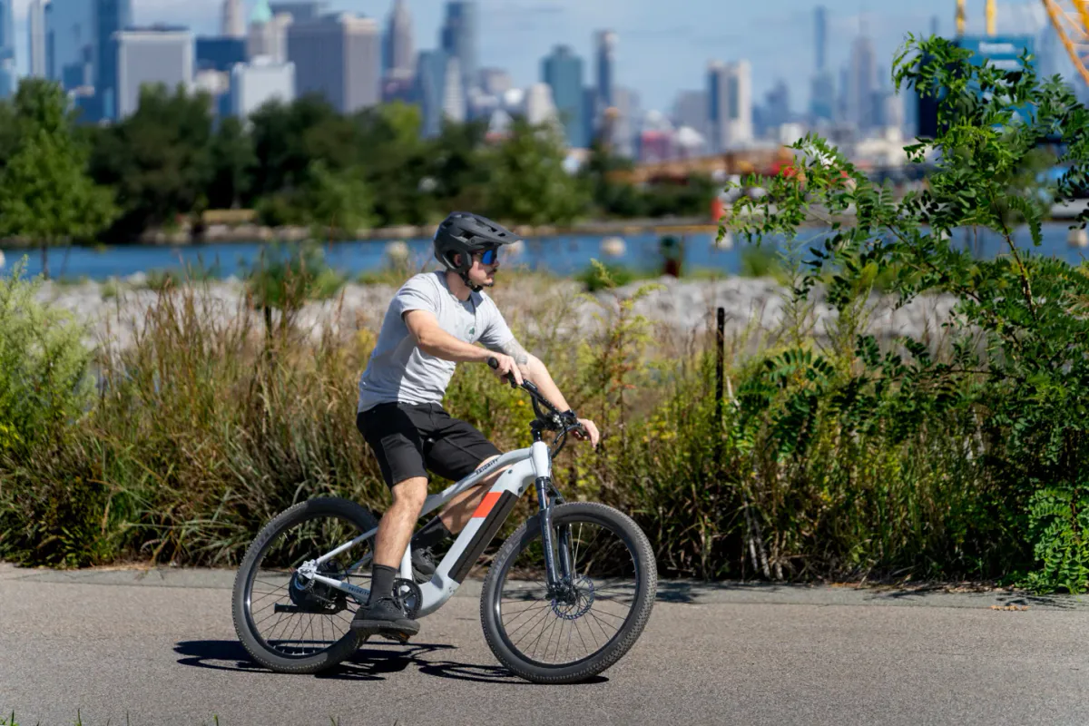 Electric bicycle with a belt drive and rear hub motor
