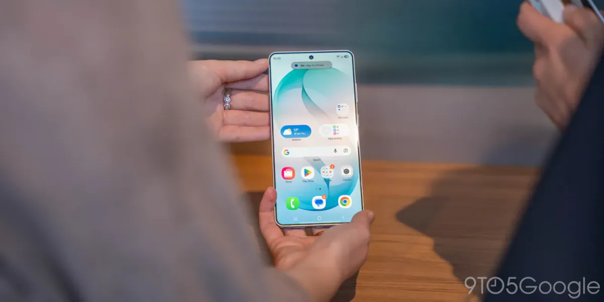 Smartphone on a desk beside a wireless router
