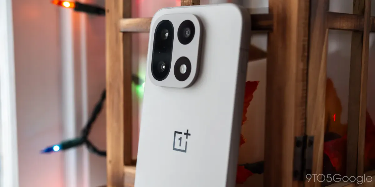A smartphone and tablet resting side by side on a desk