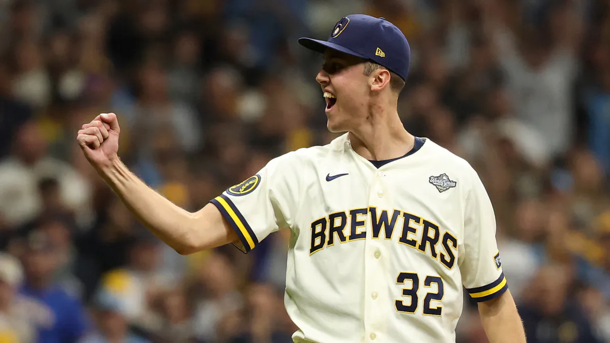 Baseball and pitching glove on a mound