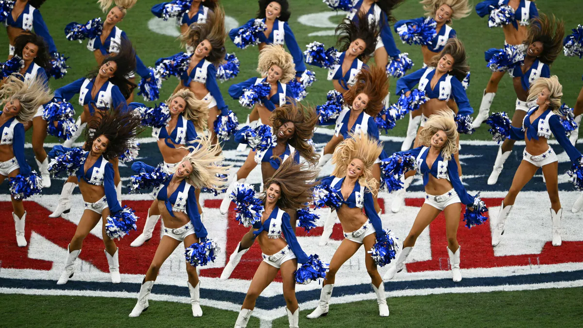 Pom-poms beside a football field