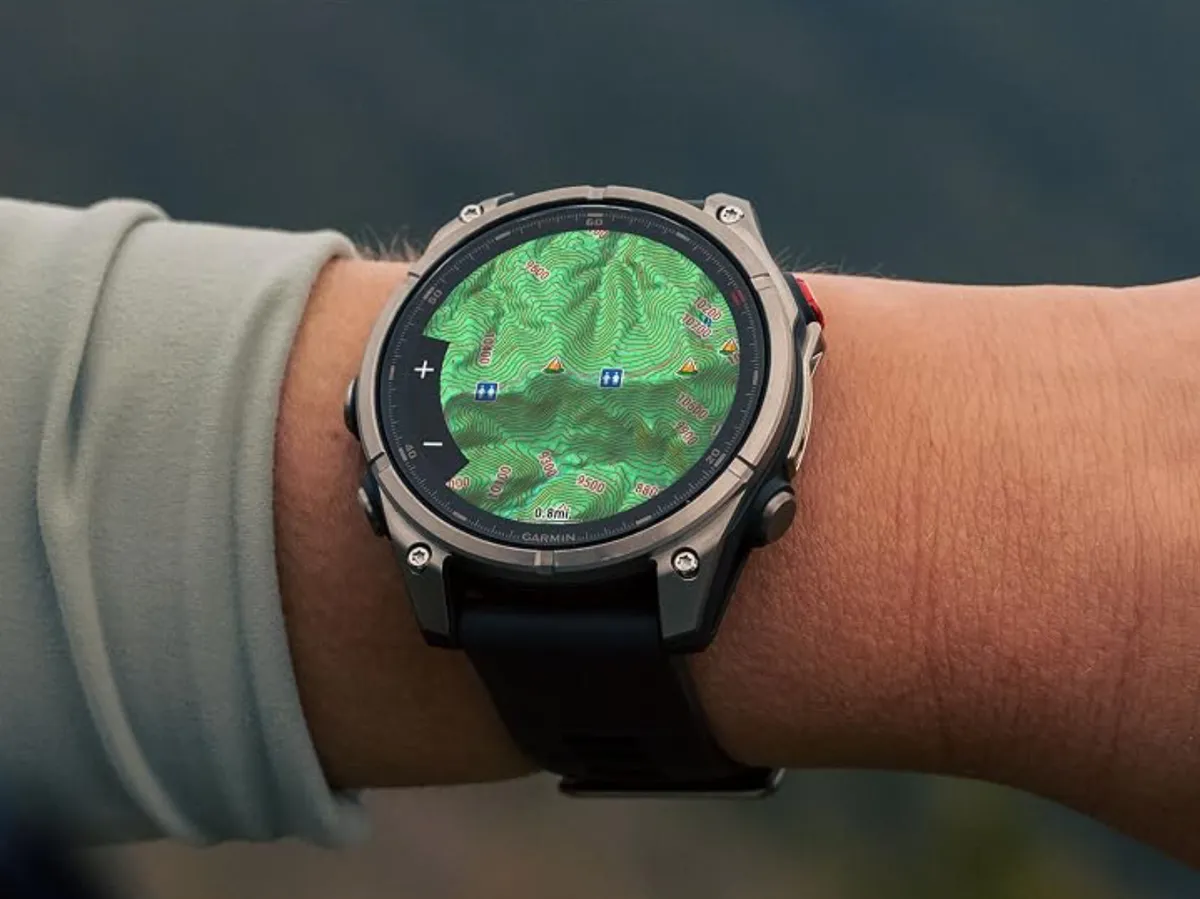 Smartwatch displaying fitness data on a neutral background
