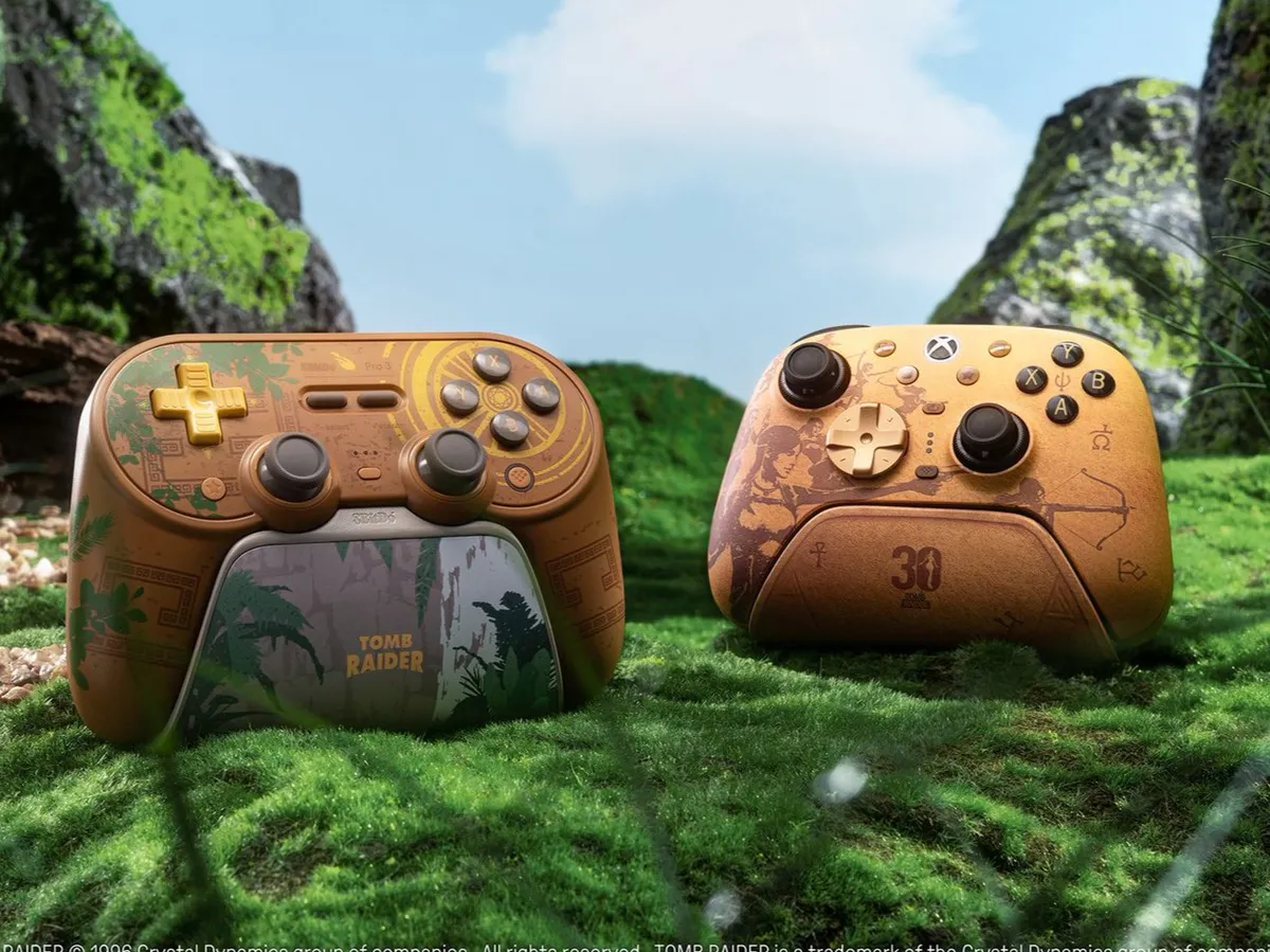 Two gaming controllers beside a game console