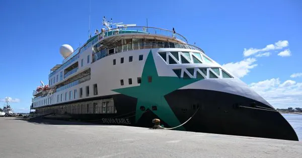 Expedition cruise vessels moored at a port