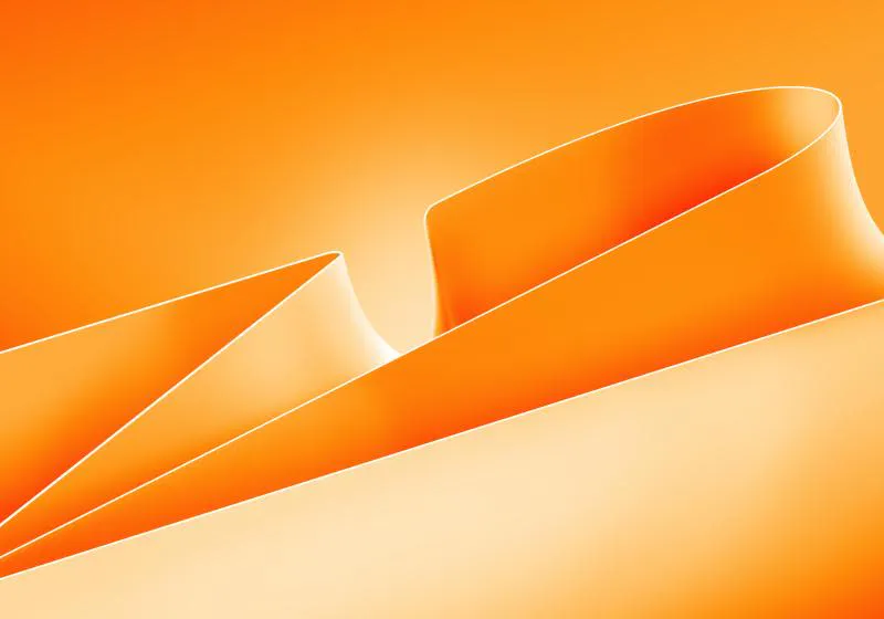 Abstract flowing ribbons in contrasting colors on a computer display