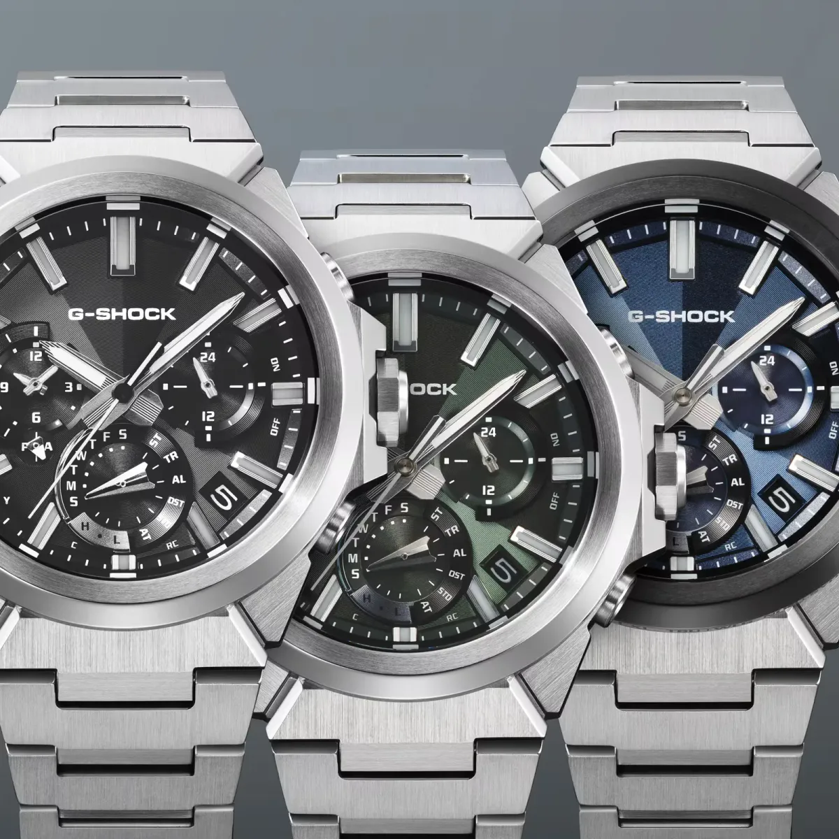 Illustration of three metal wristwatches with different dial colors