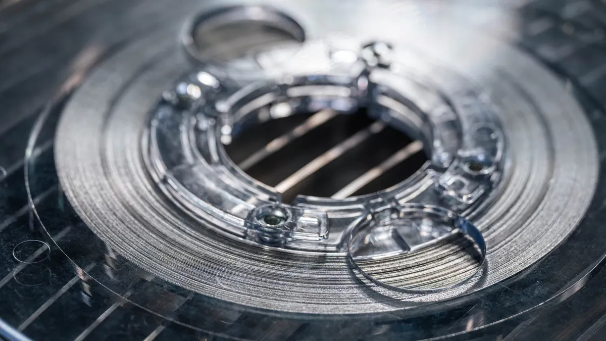 Illustration of magnetic coils surrounding a fusion chamber