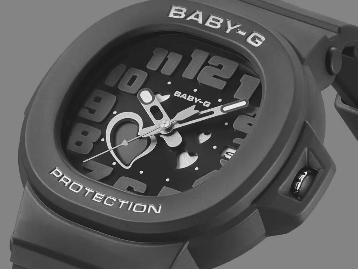 Illustration of black and white analog wristwatches with heart-shaped dial details
