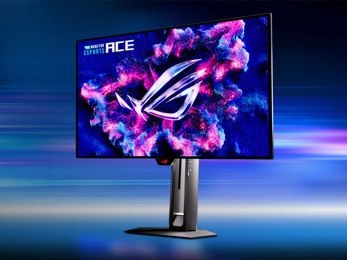 Gaming monitor on a desk beside a keyboard and mouse