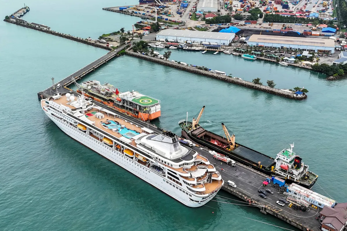A cruise ship docked at a port