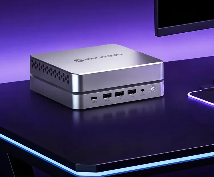 Compact desktop computer with memory modules and connection ports