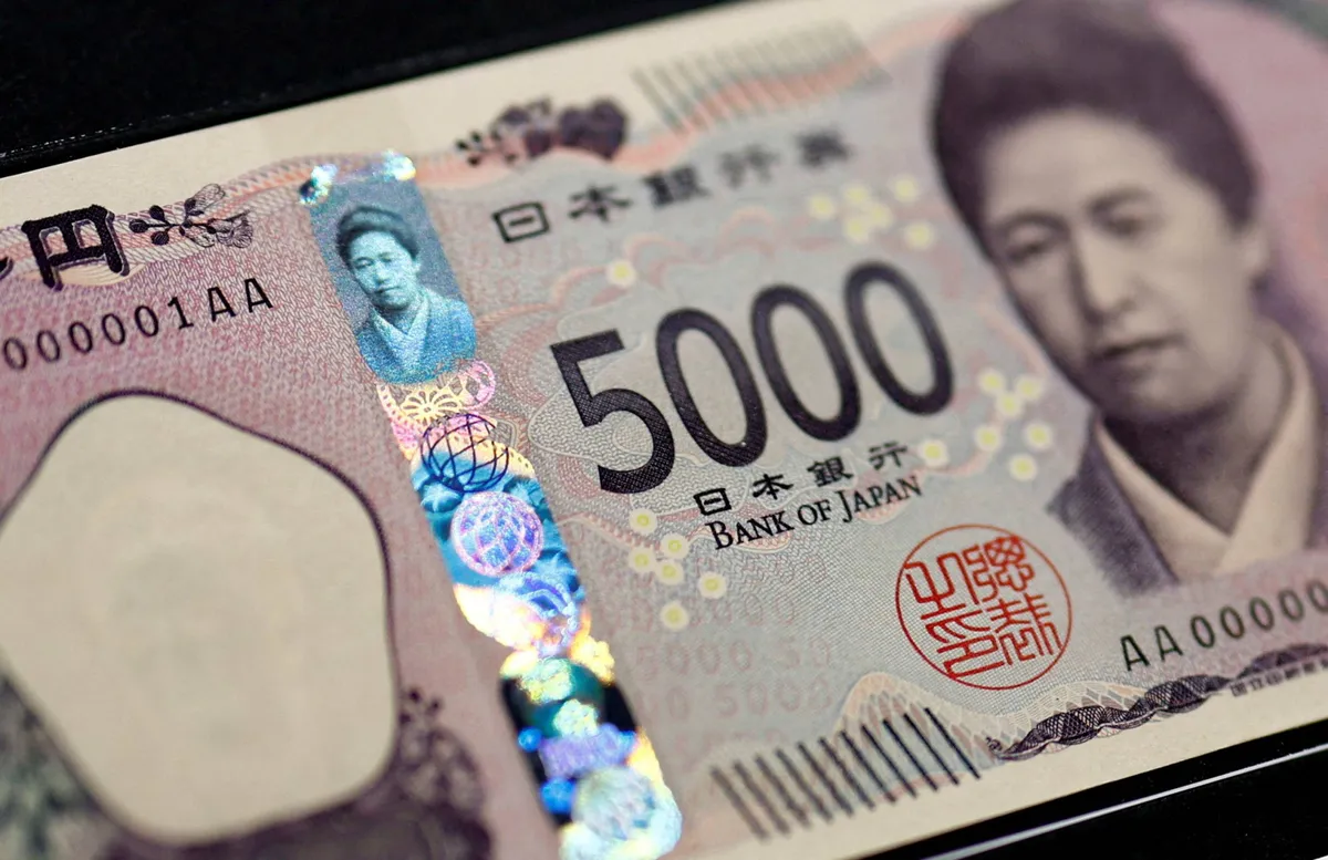 Japanese yen banknotes and coins on a table