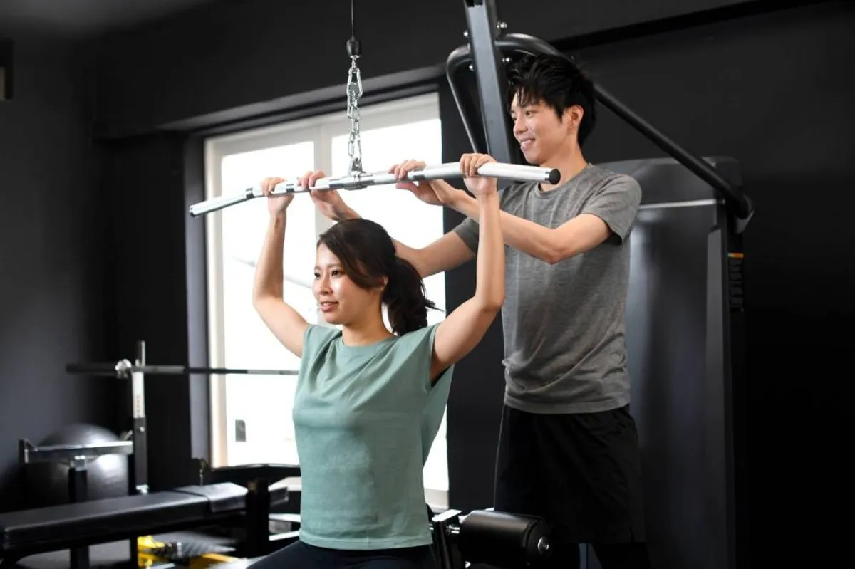 Exercise equipment and a clipboard in a gym